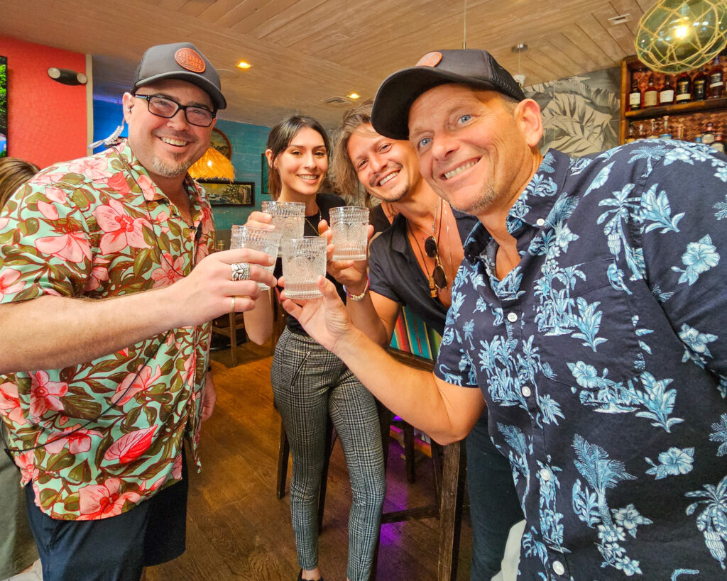 Christian and Justin take shots with customers during soft opening