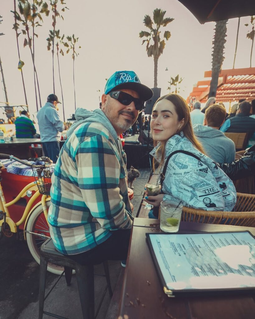 A couple attends the Venice Beach block party fire relief fundraiser. Photo by @hso.films