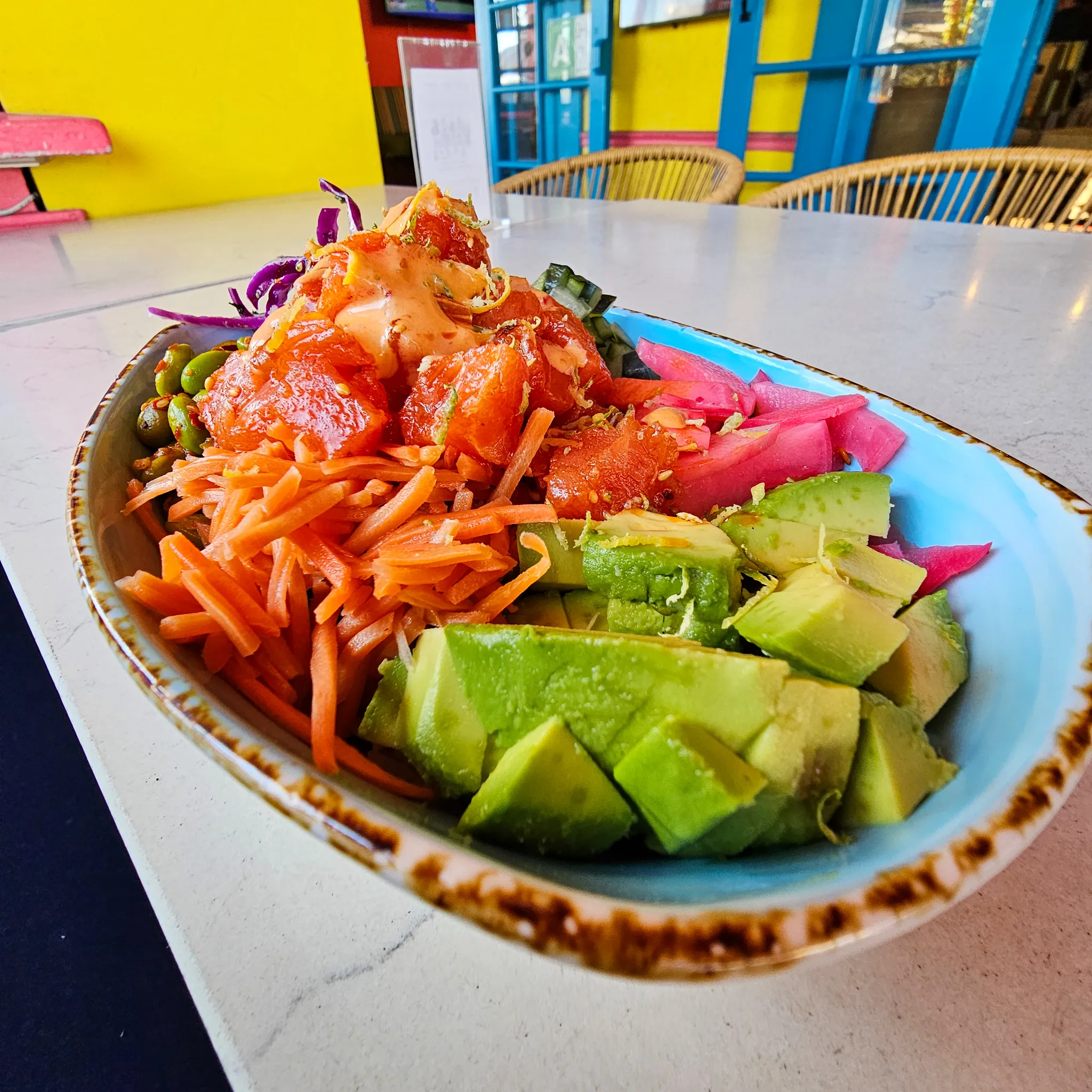 Poke Bowl at Nalu Vida Venice Beach restaurant, ahi, salmon or beets with bang bang sauce