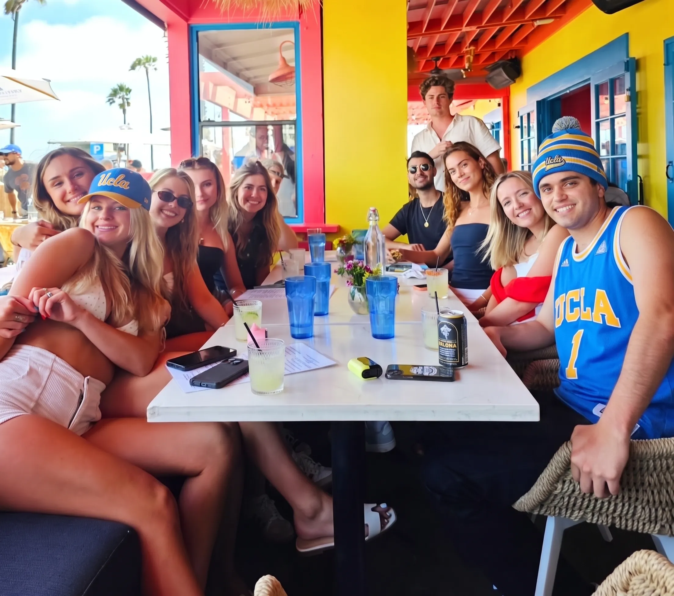 UCLA fans watching a game at Nalu Vida in Venice Beach